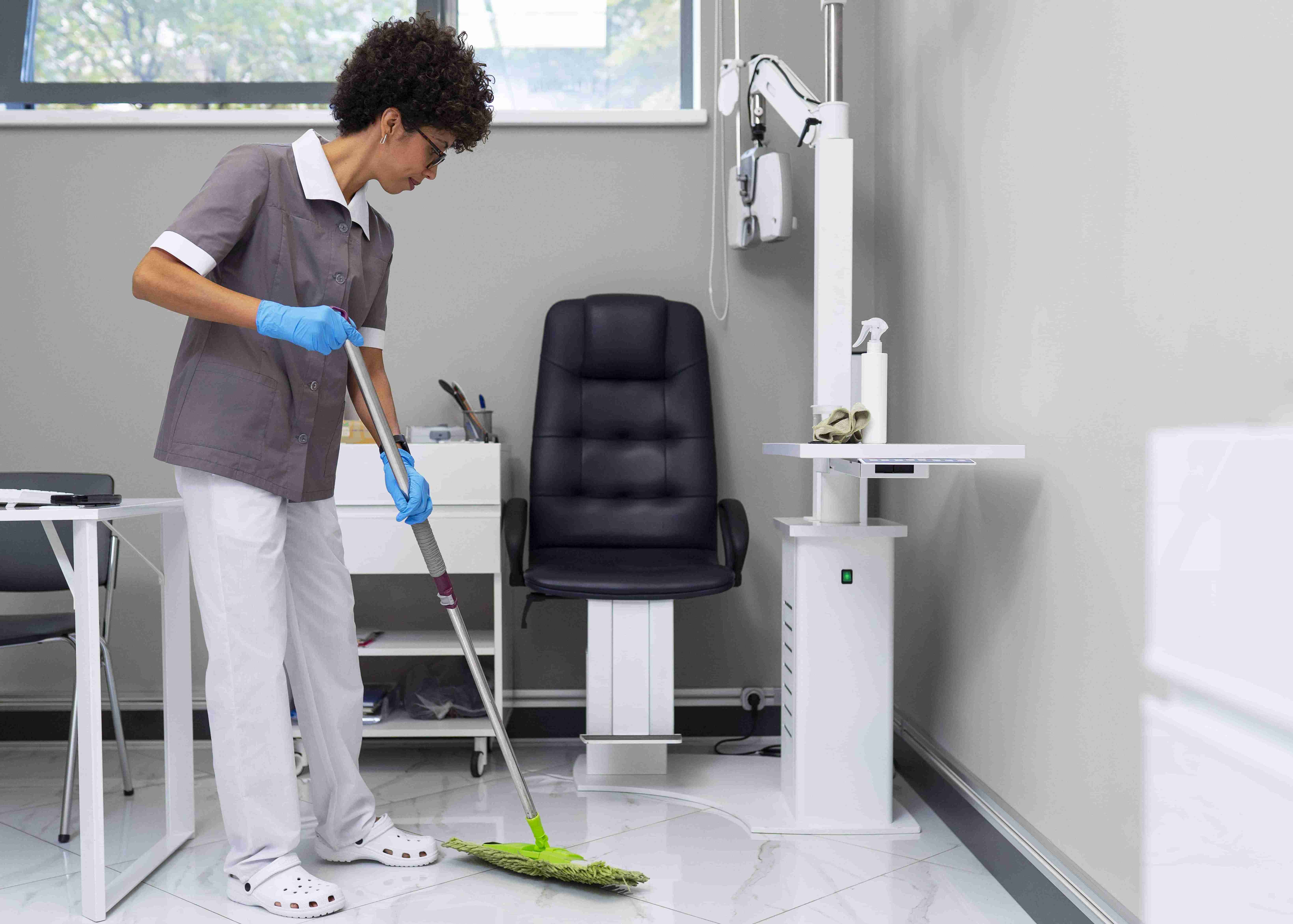 woman cleaning ophthalmologist s office min (1) min 11zon